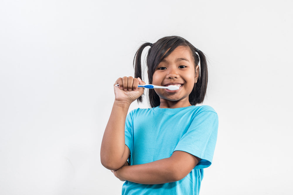 Exploring the dark side of using fluoridated toothpastes for children